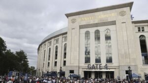 Fans line up to enter Yankee Stadium prior to a matchup against the Boston Red Sox.|Art or Photo Credit: AP