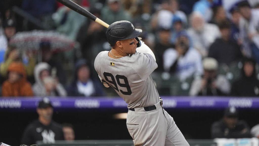 Aaron Judge follows the flight of his RBI double off Rockies reliever Jake Bird.|Art or Photo Credit: AP