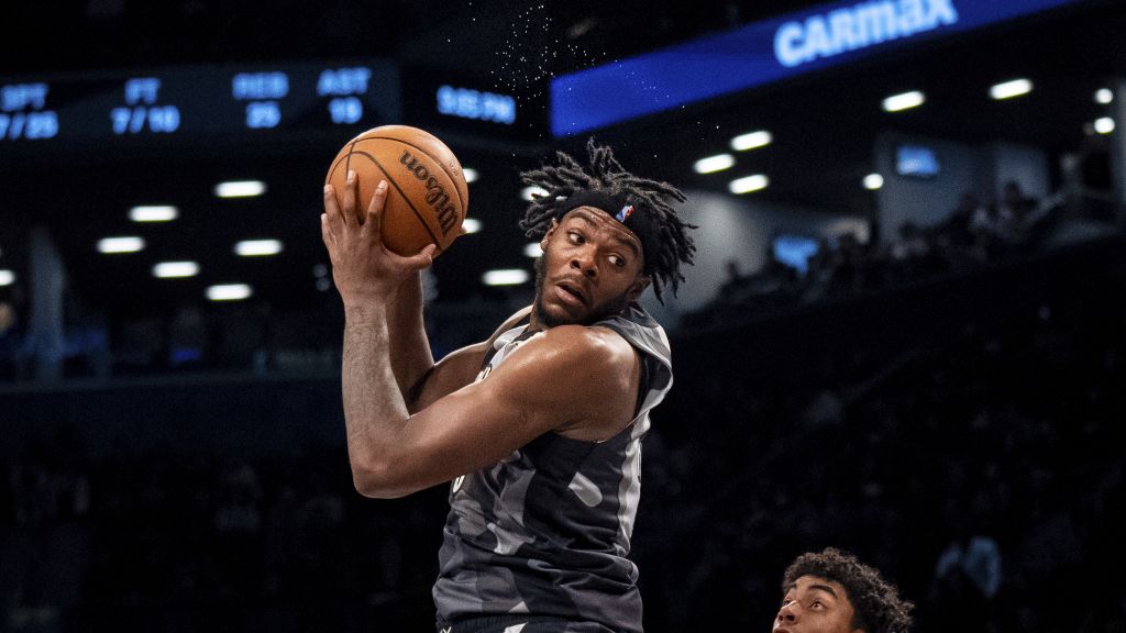 Day'Ron Sharpe grabs a rebound against the Dallas Mavericks on March 24, 2025.|Art or Photo Credit: AP