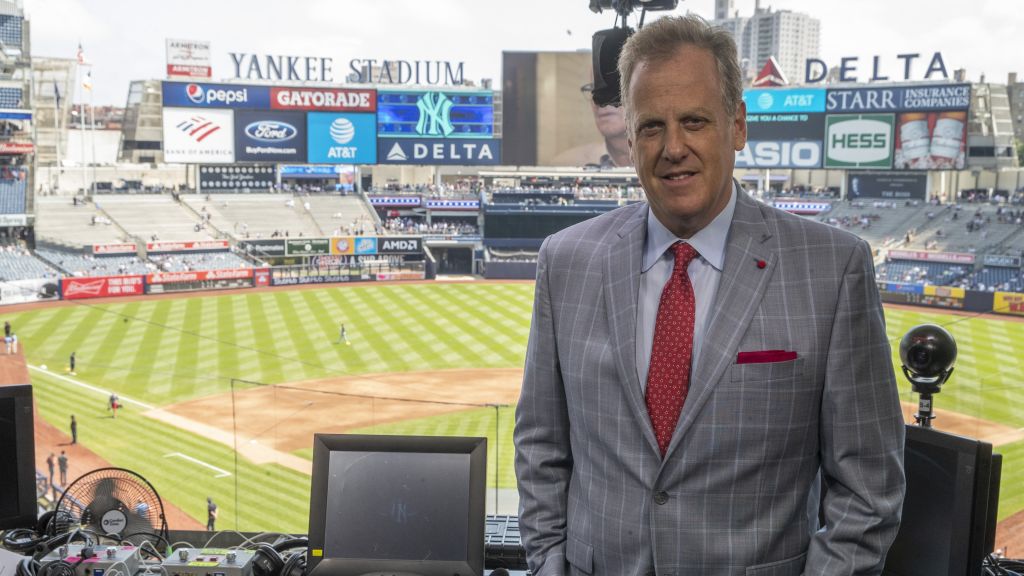 Broadcaster Michael Kay poses inside the YES Network television booth at Yankee Stadium.| Art or Photo Credit: AP