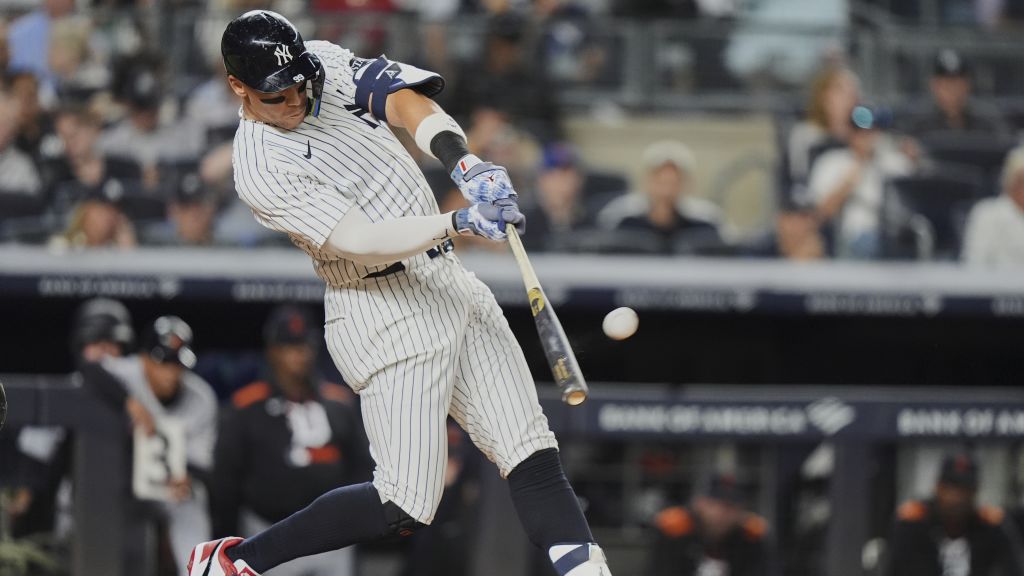 Aaron Judge hits a home run during the third inning against the Detroit Tigers on Thursday in New York to tie Joe DiMaggio for fourth place in Yankees history.|Art or Photo Credit: AP